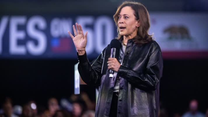 This image clearly shows Kamala Harris speaking, which is relevant to her relaunching a campaign. The composition is professional and visually impactful.